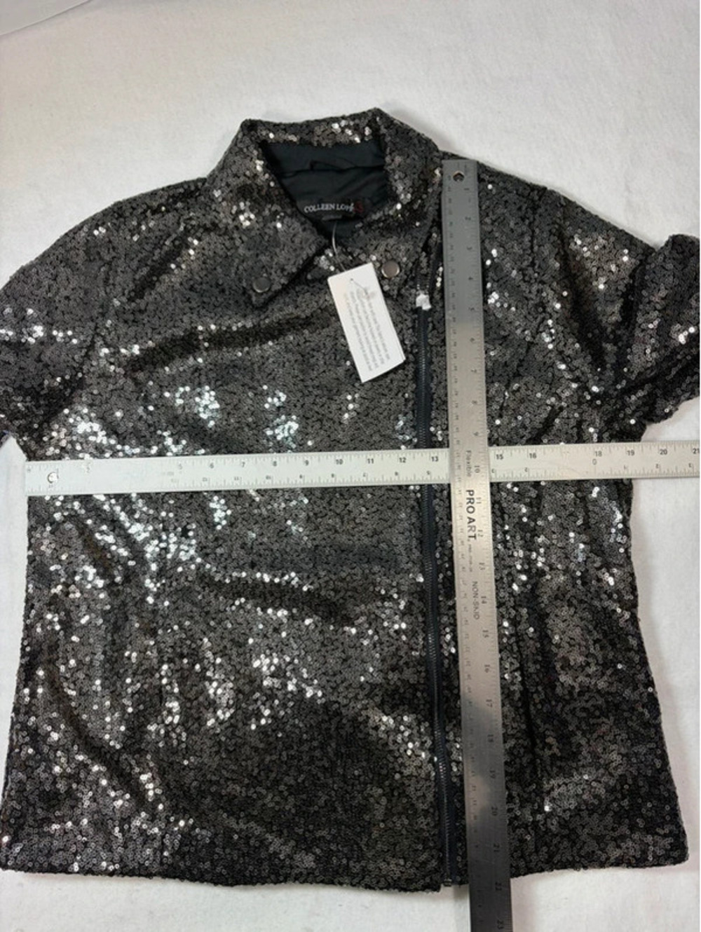 Small (runs big) Colleen Lopez sequin moto jacket